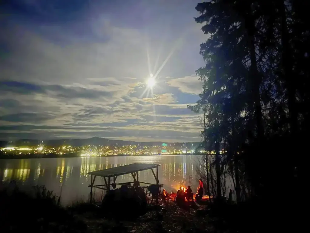 Group outdoors by a campfire